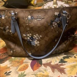 Floral coach over shoulder purse